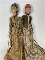 2 early wooden rod puppets