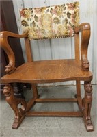 Ornate carved wooden  side chair with upholstered
