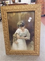 Ornate gold framed print of woman and child