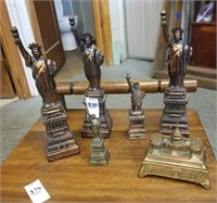 Metal Statues of Liberty and Capitol building