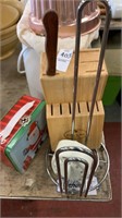 Toaster, knife block, jello mold, timer and paper
