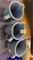 3 decorative pottery pitchers