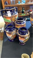 4 piece oriental vase set