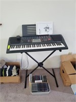 CASIO CTK518 KEYBOARD, STAND, AND EXTRA CDS