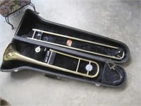 Conn trombone in case