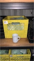 Milk crate of coffee mugs