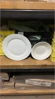 Milk crate of dinner plates and some bowls