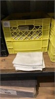 Milk crate of cleaning rags