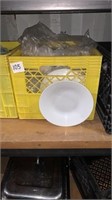 Milk crate of shallow bowls