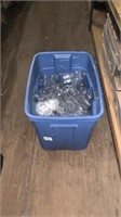 Bin of plastic containers with some lids
