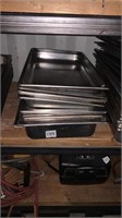 11 large metal containers with two lids