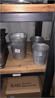 3 metal measuring jugs