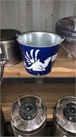bucket with lobster cracking tools