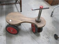 childs sit on scooter.  wood and plastic-18" long