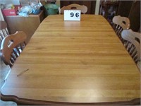 Wood dining table with 6 chairs and 2 leaves
