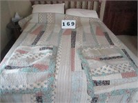 Queen size machine stitched quilt with shams