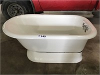 CAST IRON SOAKER TUB W BASE & FAUCETS