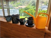 Assorted Garden Pots and Watering Can