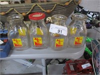 4 SMALL MILK BOTTLES