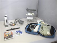 Nintendo Wii with games and extras. Tested