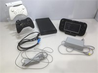 Wii U. Complete setup with pro controllers.