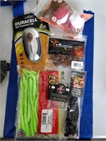 lot of fishing supplies , bait , weights ,
