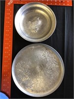 2 unmarked pieces of aluminum trays