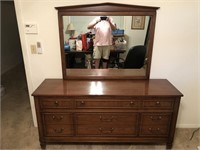 MCM 9 DRAWER MIRRORED DRESSER. 64 INCHES LONG A