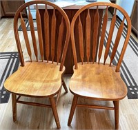 Two solid wood kitchen chairs