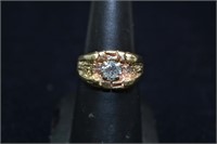 Gent's 14kt gold nugget ring set with approx. 0.95