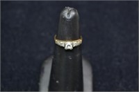 Lady's 14kt gold ring set with approx. 0.15ct diam