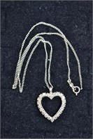 14kt white gold heart pendant on 15" chain set wit