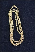 14kt gold 24" rope necklace with a barrel clasp, 1