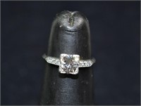 Lady's platinum 0.6ct diamond solitaire ring, 1.7d