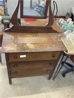 Antique dresser with mirror on wheels