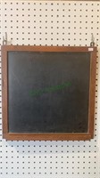Antique wood framed chalkboard with the chalk