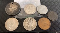 7 coins - US silver peace dollar 1922 with a hole