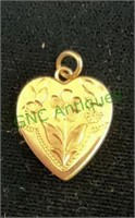 Jewelry - marked 14k gold heart locket with