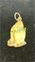 Jewelry - marked 14k gold charm/pendant - praying