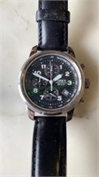 Timex chronograph wristwatch with tachometer.