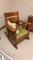 Wide wooden rocking chair