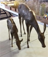 2 metal doe figurines