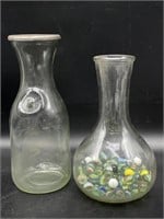 (2) Glass Bottles (one with marbles) 9.75” and