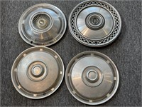 (4) Wheel Covers : (2) Ford and (2) Unmarked)