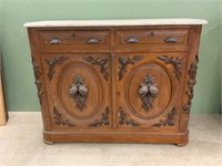 Antique Marble top buffet with hand carved pulls