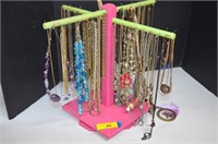 60 Plus Necklaces in Rotating Display