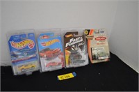 Four Mustang Die Cast Cars