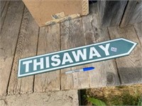 THIS WAY SIGN