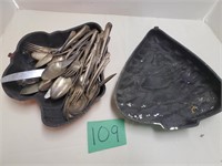 lot of older silverware and cake pans