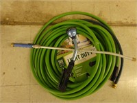 assorted garden hoses and accessories